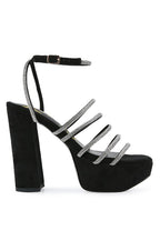 Black strappy platform sandals with rhinestone accents for stylish occasions