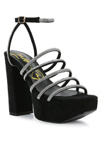 Women's black strappy platform sandals with rhinestone embellishments