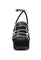 Women's black strappy platform sandals with rhinestone accents