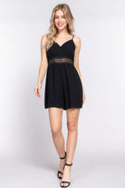 Stylish black summer romper for women with lace detailing and adjustable straps for a comfortable fit