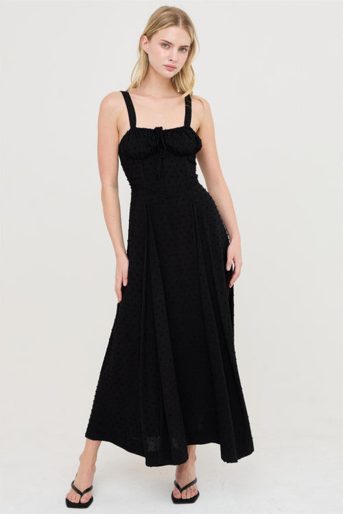 Black tiered maxi dress, perfect for back tie dress code events