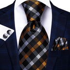 Men's designer tie in black and gold for formal black tie wedding guest dress