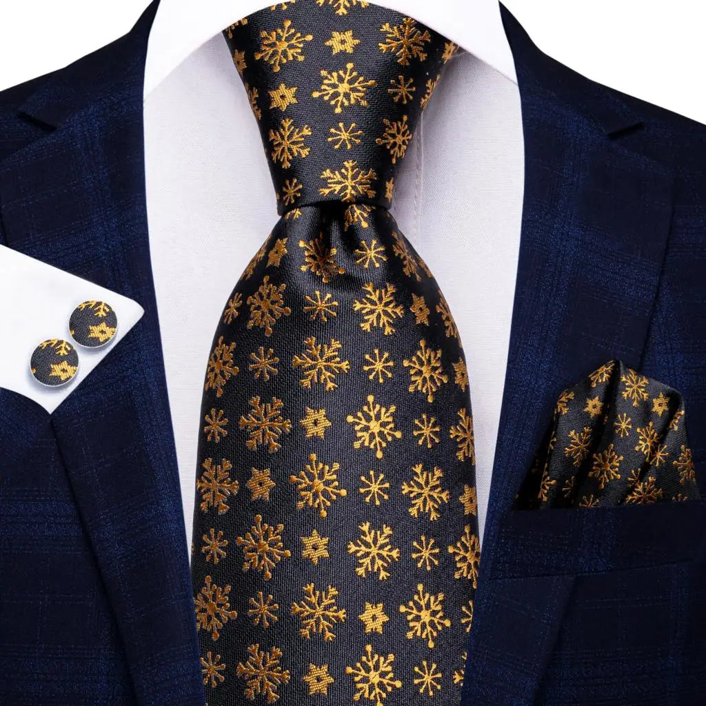 Elegant black tie wedding guest dress, adorned with golden snowflake pattern