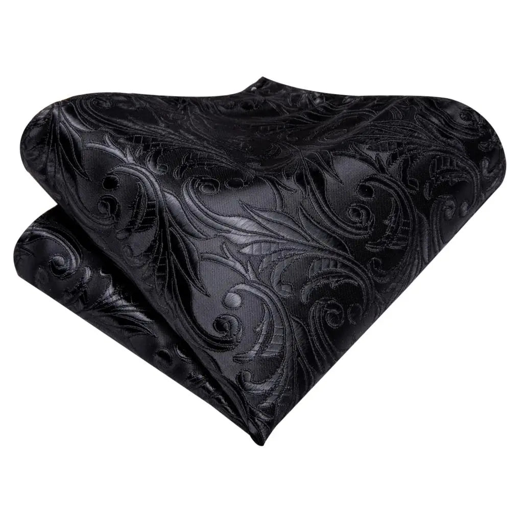 Black tie wedding guest dress fabric with elegant floral pattern