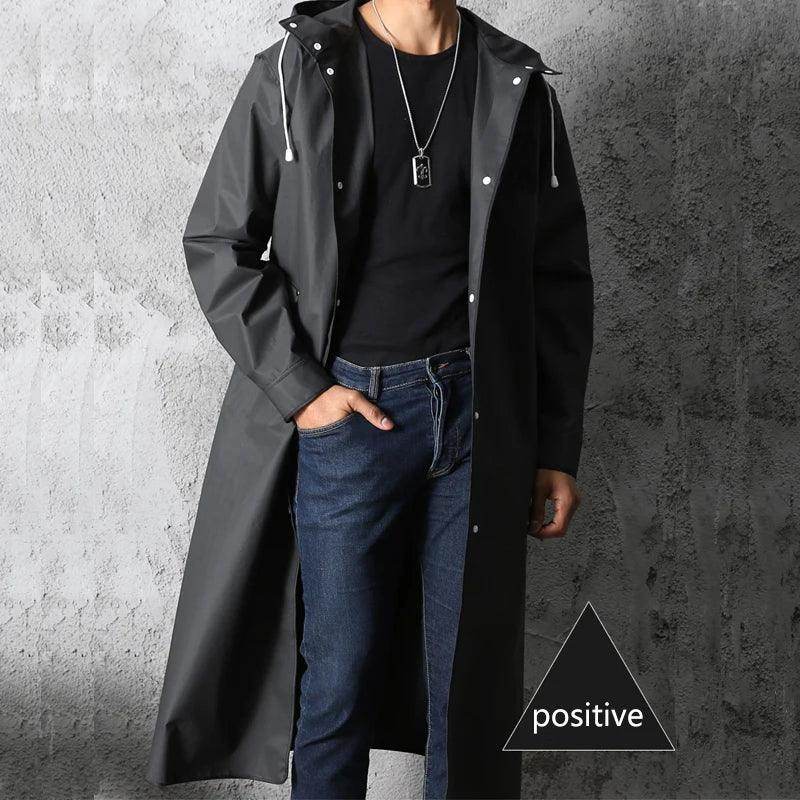 Black waterproof raincoat for adults, ideal for travel and outdoor use