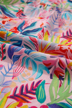 Women's floral blouse in vibrant colors, perfect for summer outings