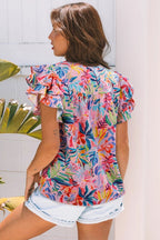 Women's floral blouse by JUNIPER BLVD, colorful, perfect for summer outings