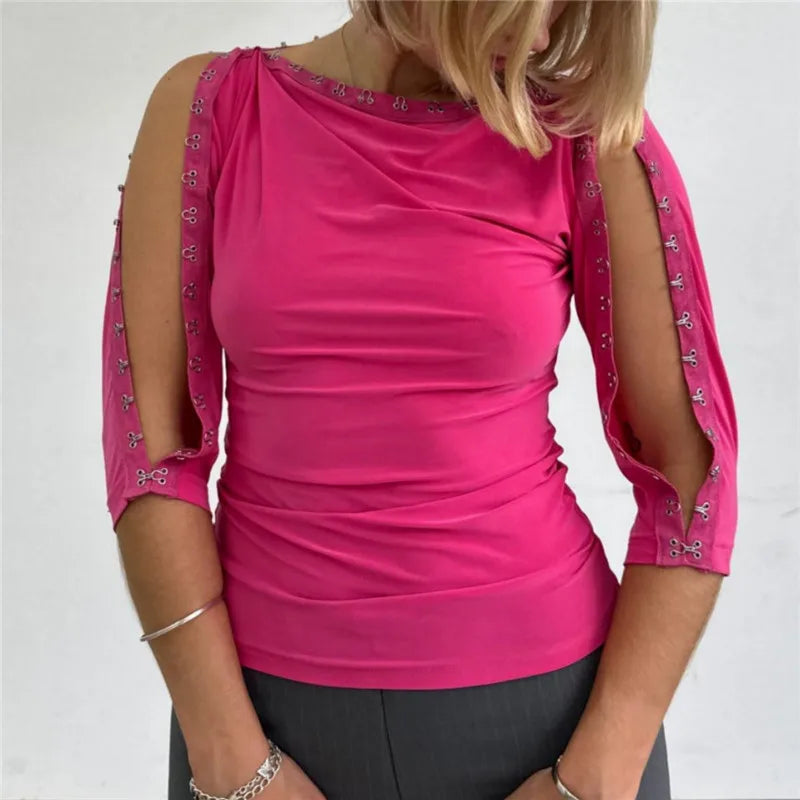 Pink blouse off the shoulder with decorative cutouts, stylish for casual wear