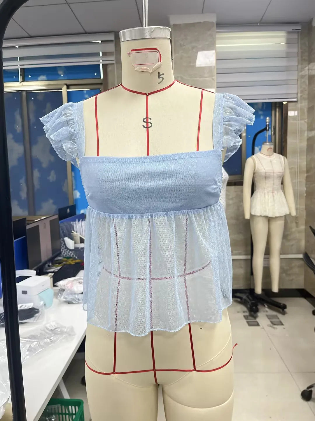 Light blue blouse peplum with ruffle sleeves for casual wear