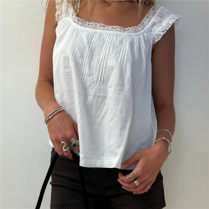 White vintage blouse with lace trim, ideal for casual outings
