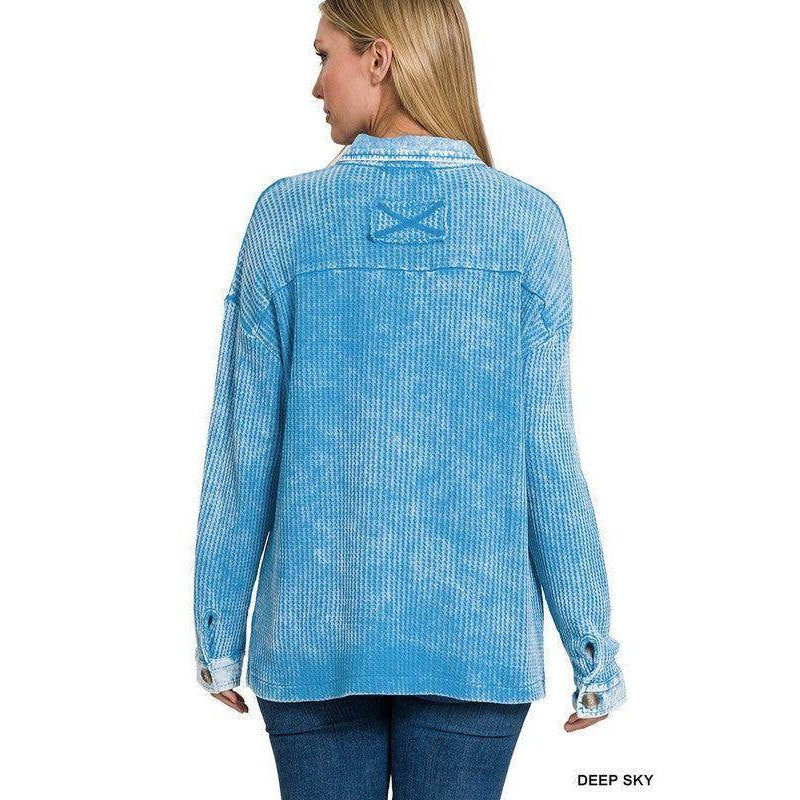 Back view of a ZENANA blue cotton shacket featuring a loose fit and buttoned cuffs