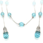 VacationGrabs blue crystal statement necklace with intricate silver accents and stunning light blue beads