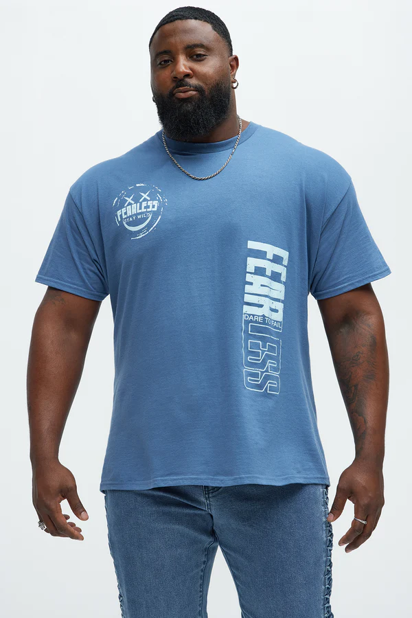 Men's blue fearless graphic tee by VacationGrabs with bold white print and casual fit