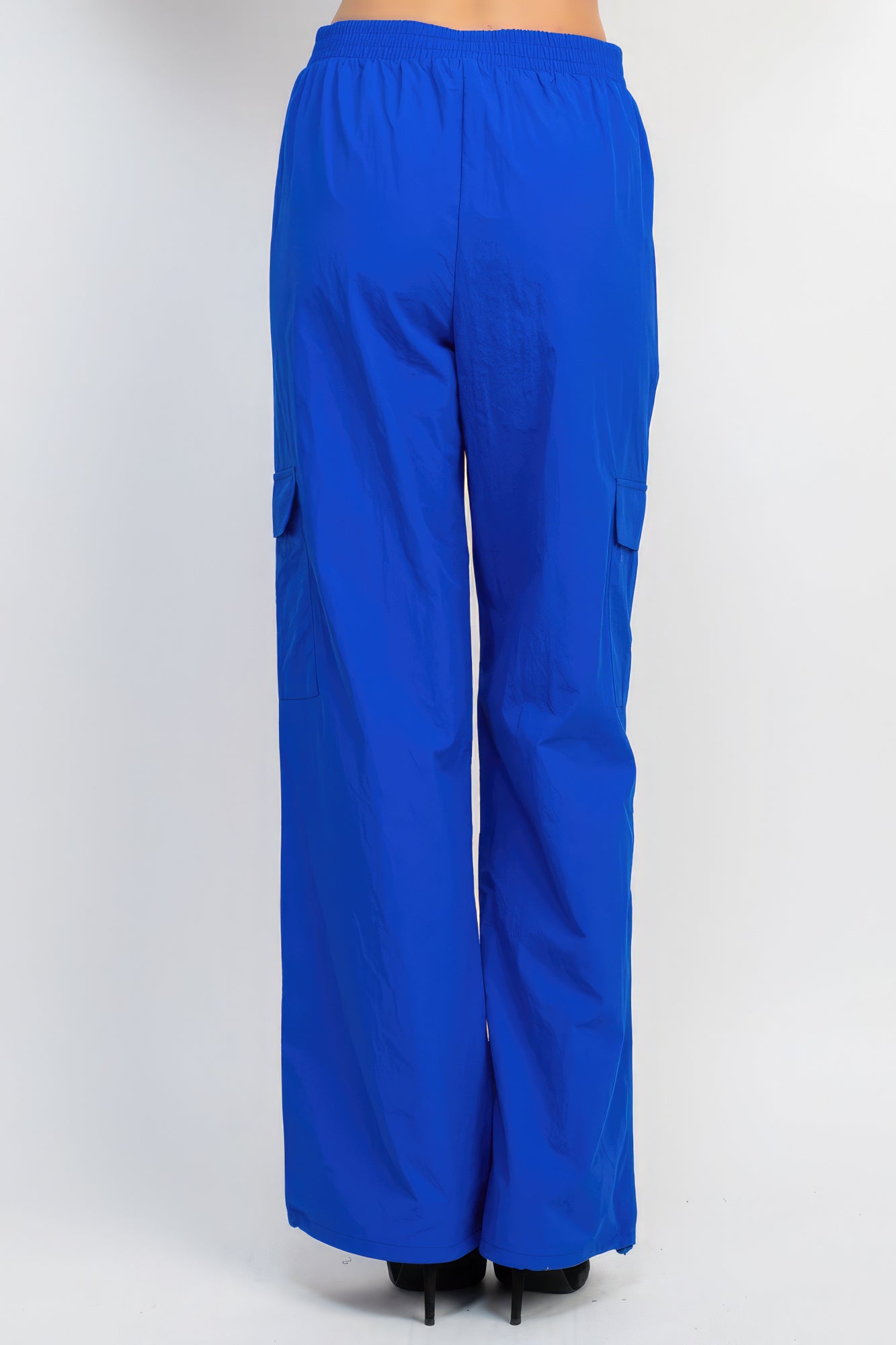 VacationGrabs women's high-rise cargo parachute pants in bright blue with elastic waistband and side pockets