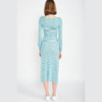 Back view of a blue scoop neck midi dress by Emory Park with long sleeves and a fitted silhouette