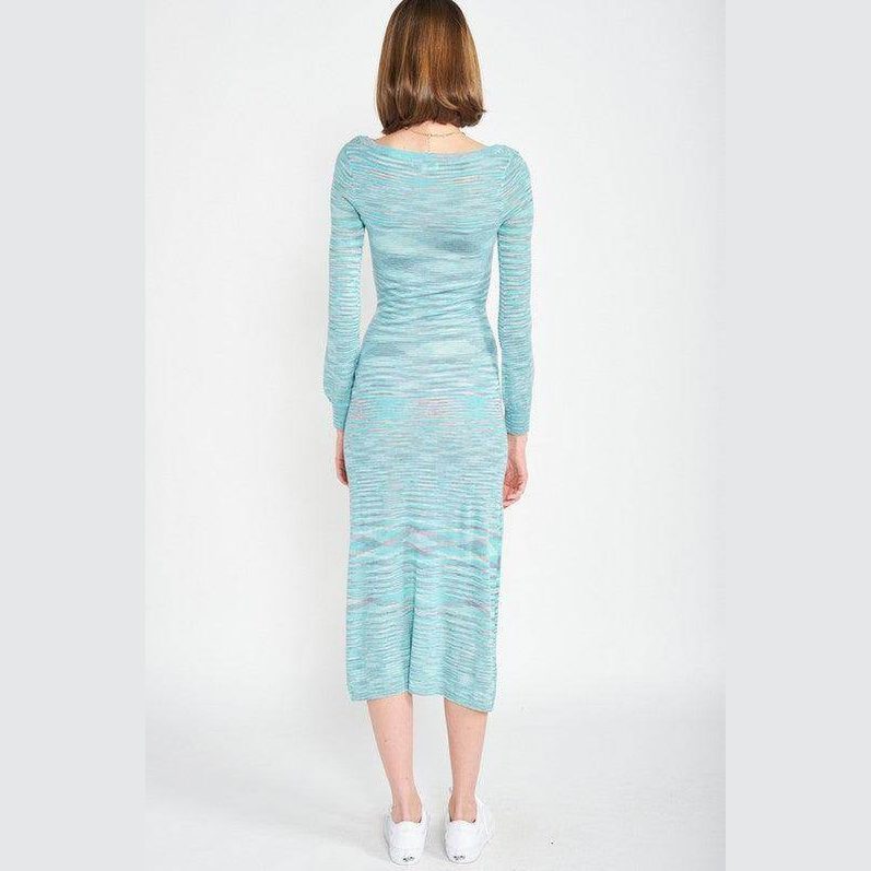 Back view of a blue scoop neck midi dress by Emory Park with long sleeves and a fitted silhouette