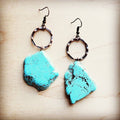 Blue turquoise chunky earrings featuring large stones and circular metal hooks