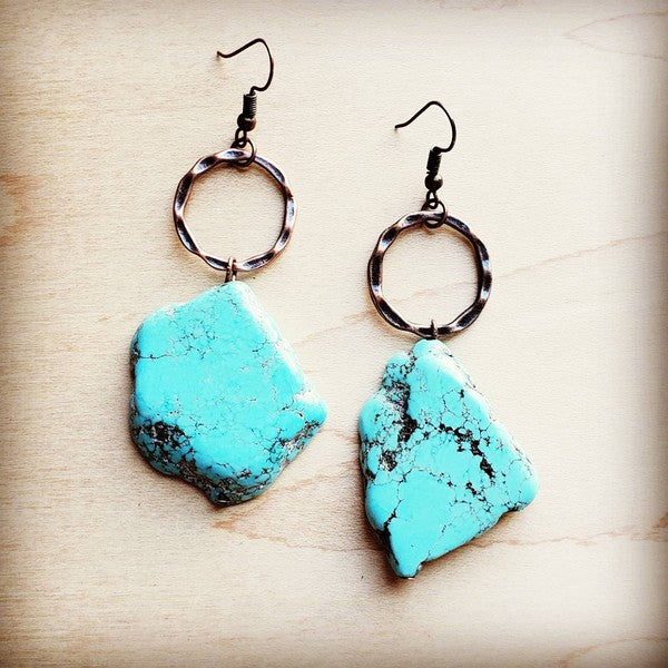 Blue turquoise chunky earrings featuring large stones and circular metal hooks