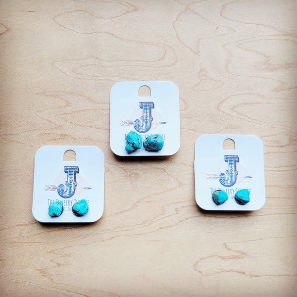 Blue turquoise stud earrings showcased on white card displays from The Jewelry Junkie