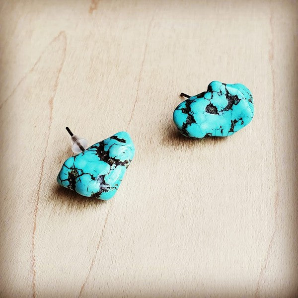 Blue turquoise stud earrings with a unique natural design and vibrant color