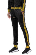Black velour jogger pants with yellow Greek key pattern trim by WEIV