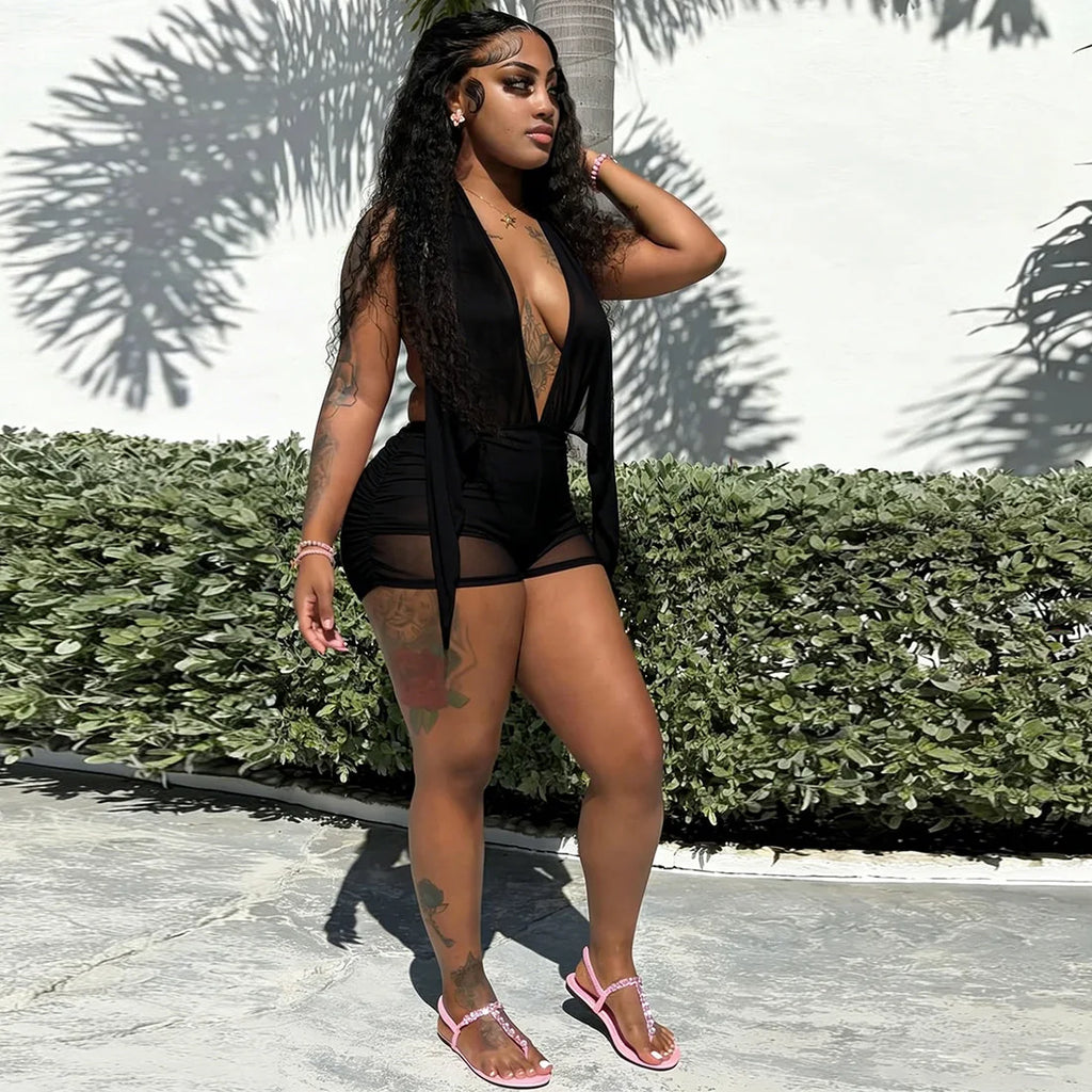 Women's black vacation outfit with bodycon dress style, perfect for warm weather