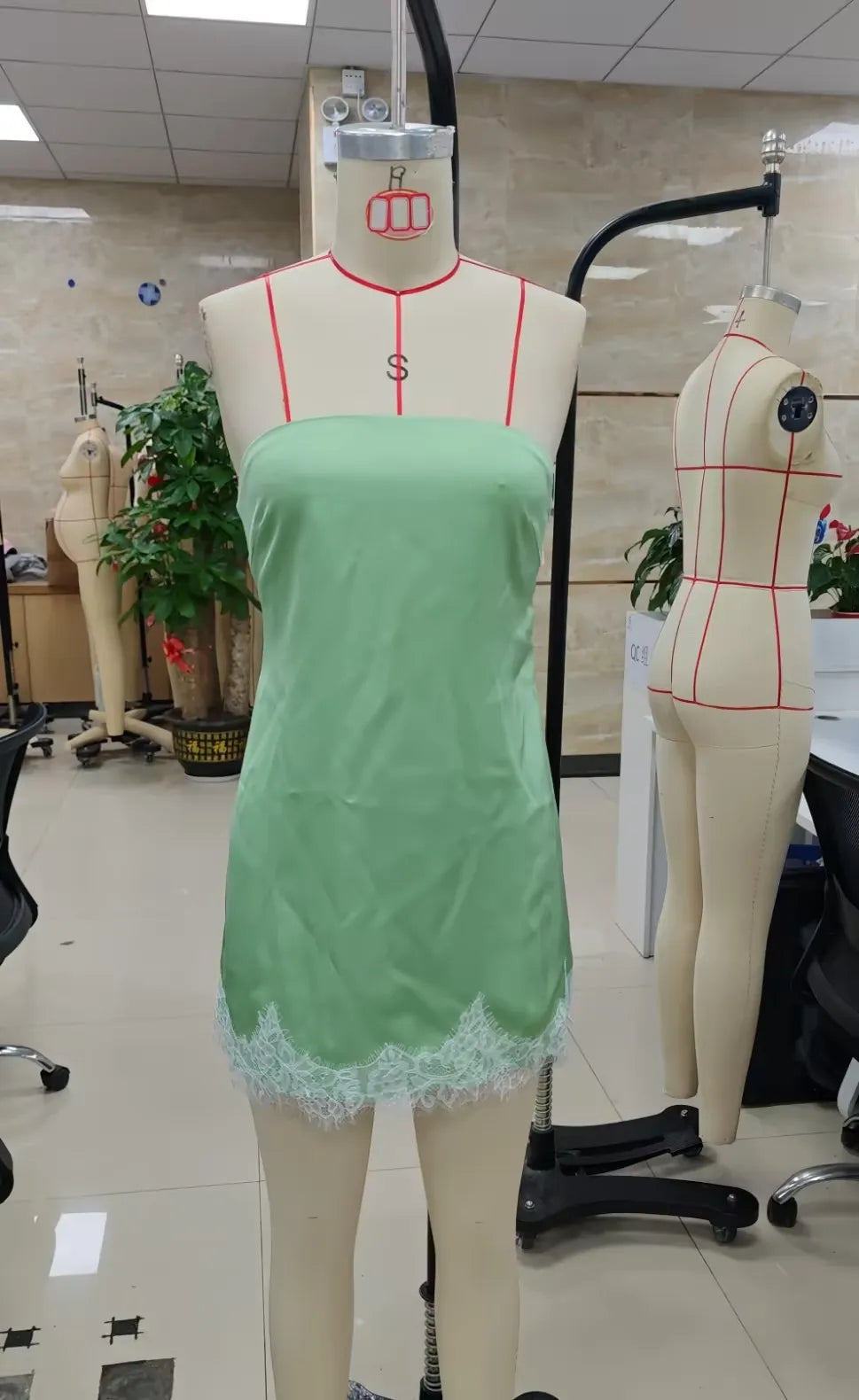 Women's light green slip dress with lace trim, perfect for summer outings and bodycon dress.