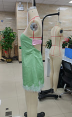 Women's green and pink bodycon dress with lace detailing, stylish summer wear