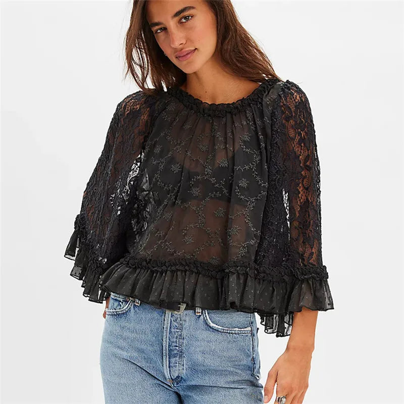Women's black boho blouse with sheer lace, perfect for casual outings
