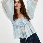 Women's boho blouse in light blue, sheer fabric for summer wear