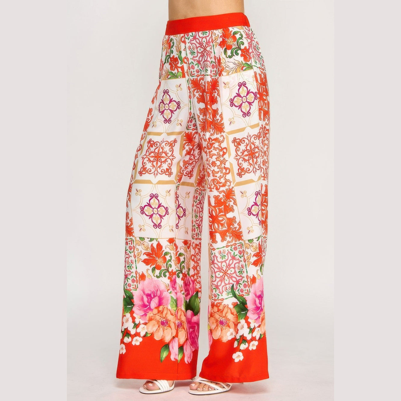 Women's boho elastic waist trousers with colorful floral and geometric patchwork print from VacationGrabs