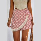 VacationGrabs boho fringe shorts for women with red geometric print and white fringe detailing