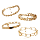 Collection of boho gold charm bracelets featuring various styles and textures for women