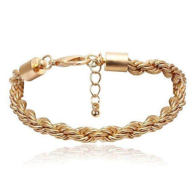 Boho gold charm bracelets with twisted design, perfect for stylish summer outfits