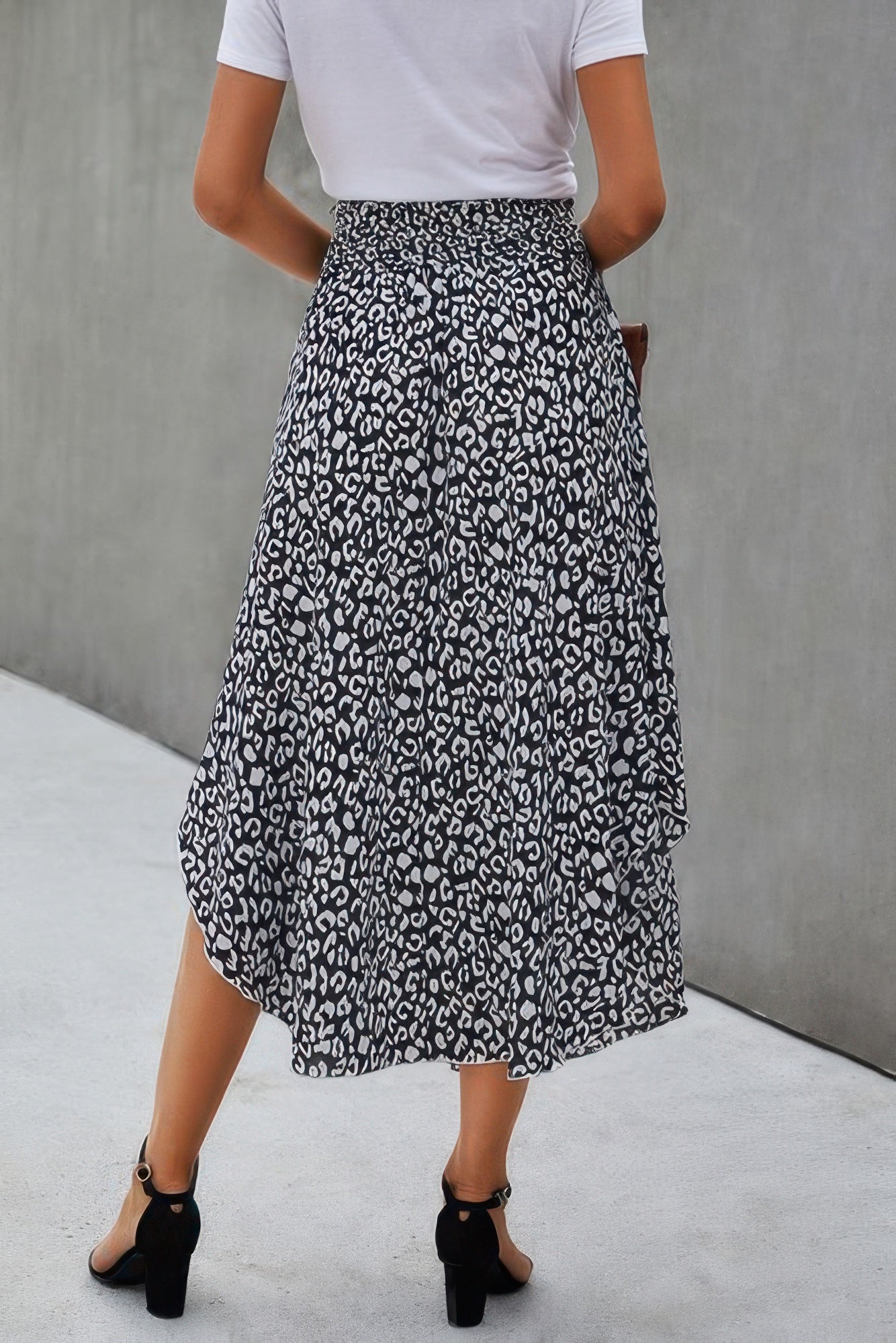 VacationGrabs women's boho print flowy skirt with black and white pattern styled with white top and black heels