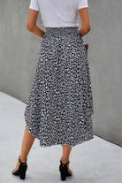 VacationGrabs women's boho print flowy skirt with black and white pattern styled with white top and black heels