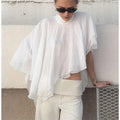 Women's white boho style blouses, lightweight and stylish for casual outings