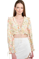 Emory Park boho style crop top with floral pattern and puffed sleeves for a trendy look