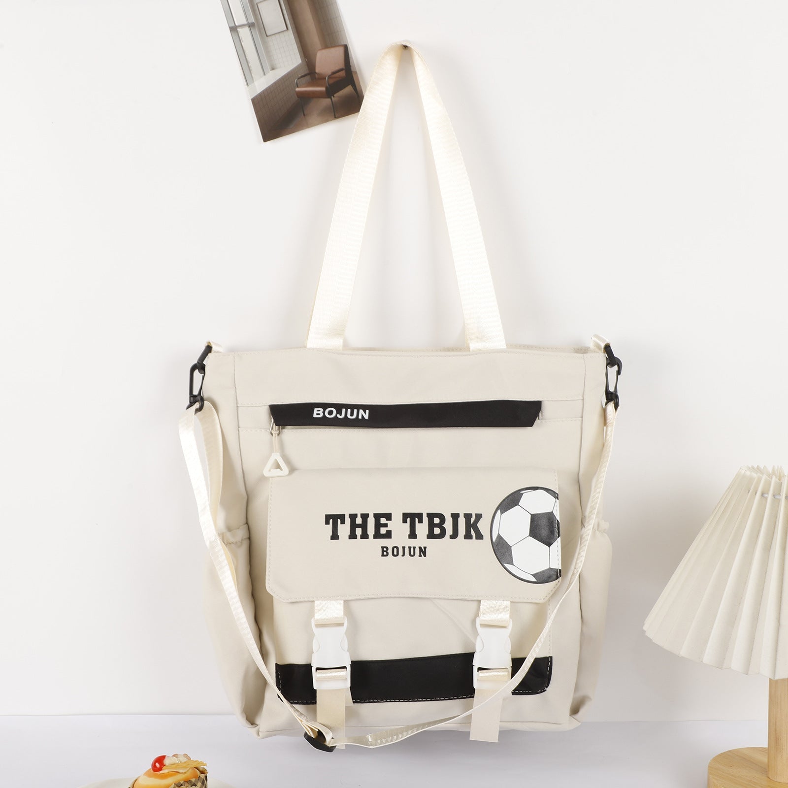 Versatile large capacity tote bag with a soccer graphic and adjustable straps for everyday use