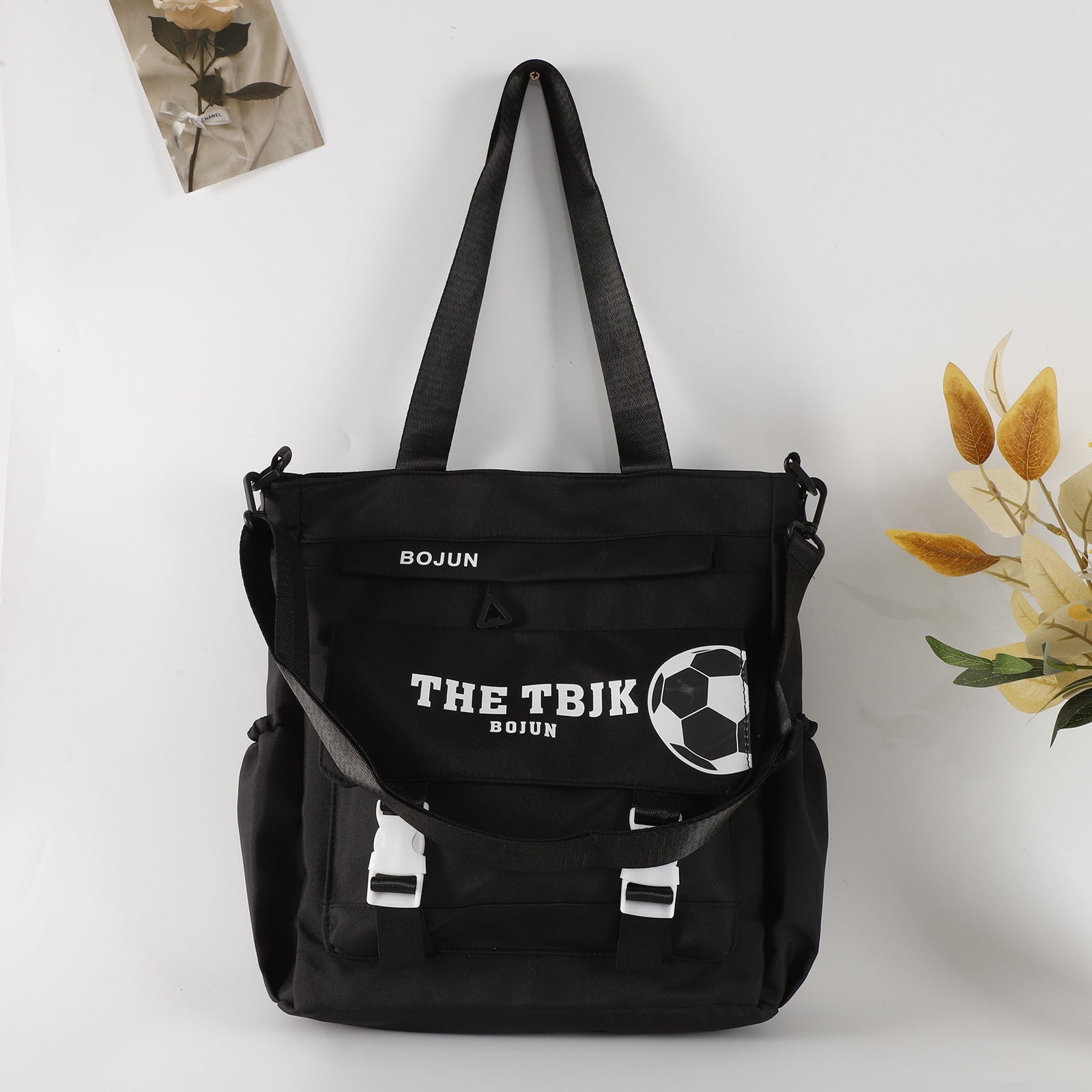 Stylish black large capacity tote bag with soccer graphic design for everyday use