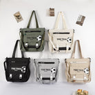 Variety of large capacity tote bags in different colors with soccer ball design from SHOMICOBOUTIQUE
