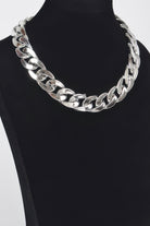 Bold statement chain necklace in shiny silver finish, ideal for adding flair to any outfit
