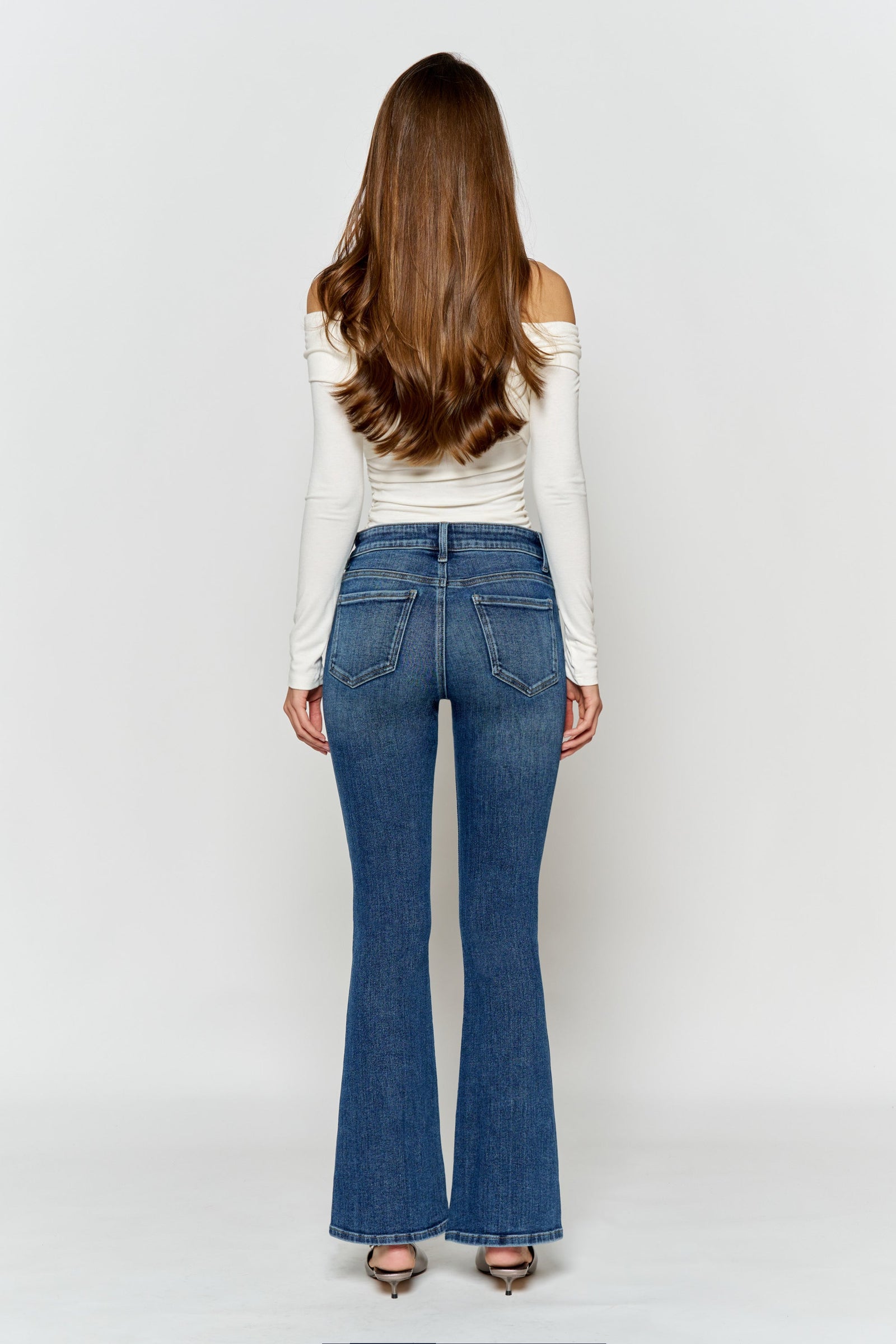 Women's bootcut jeans with boots, denim material, perfect for casual wear