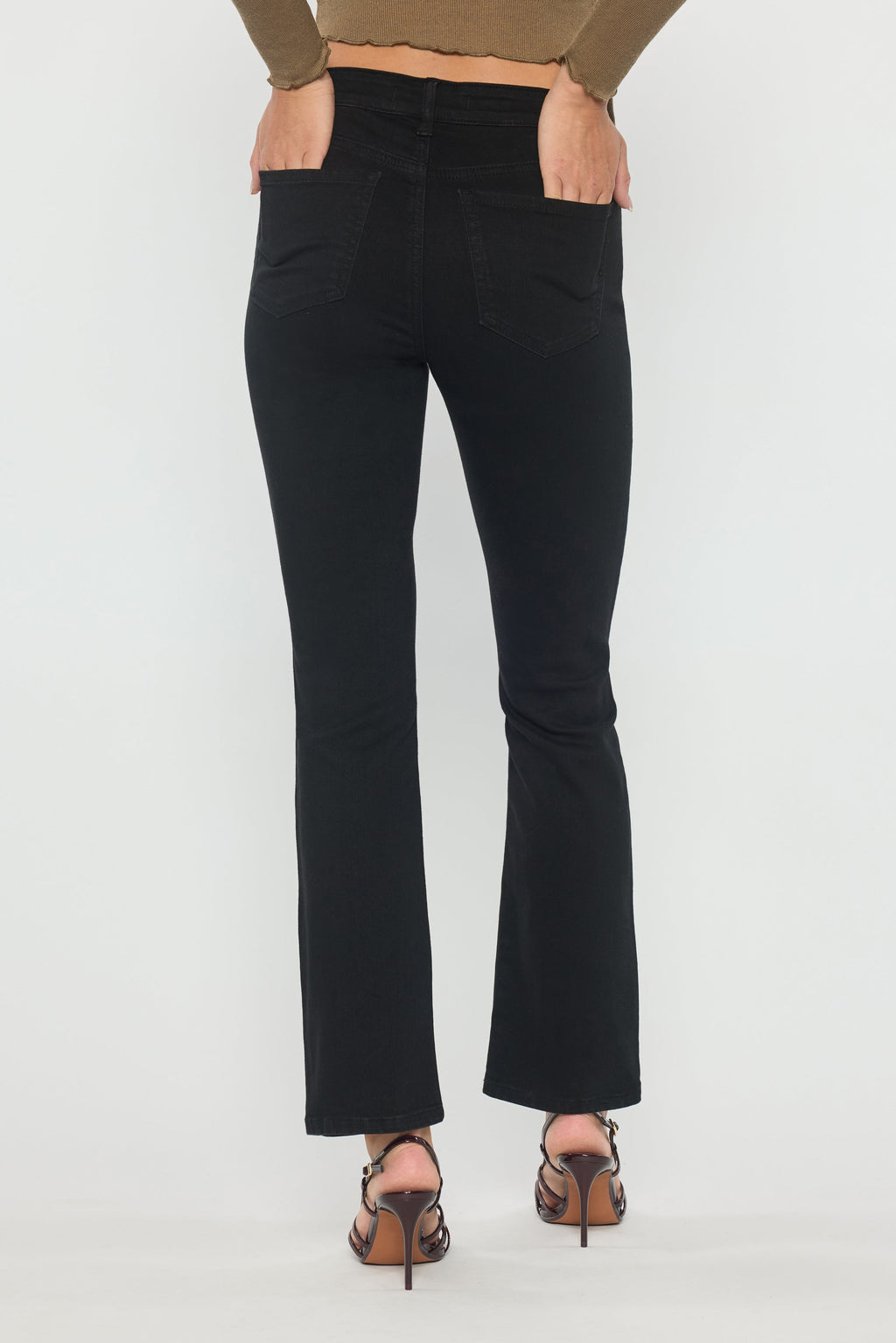 Women's black bootcut jeans, perfect for pairing with boots