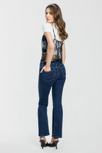 Women's bootcut jeans in dark wash, perfect for pairing with boots