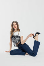 Women's bootcut jeans in dark blue, perfect for pairing with boots