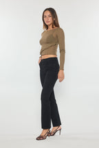 Women's black bootcut jeans with boots, perfect for casual outings