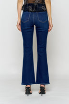 Women's bootcut jeans in dark blue, perfect for pairing with boots