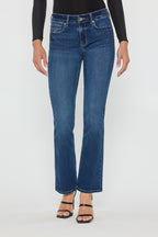 Women's bootcut jeans in dark blue, perfect for pairing with boots