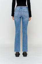 Women's bootcut jeans in light blue denim, perfect with boots